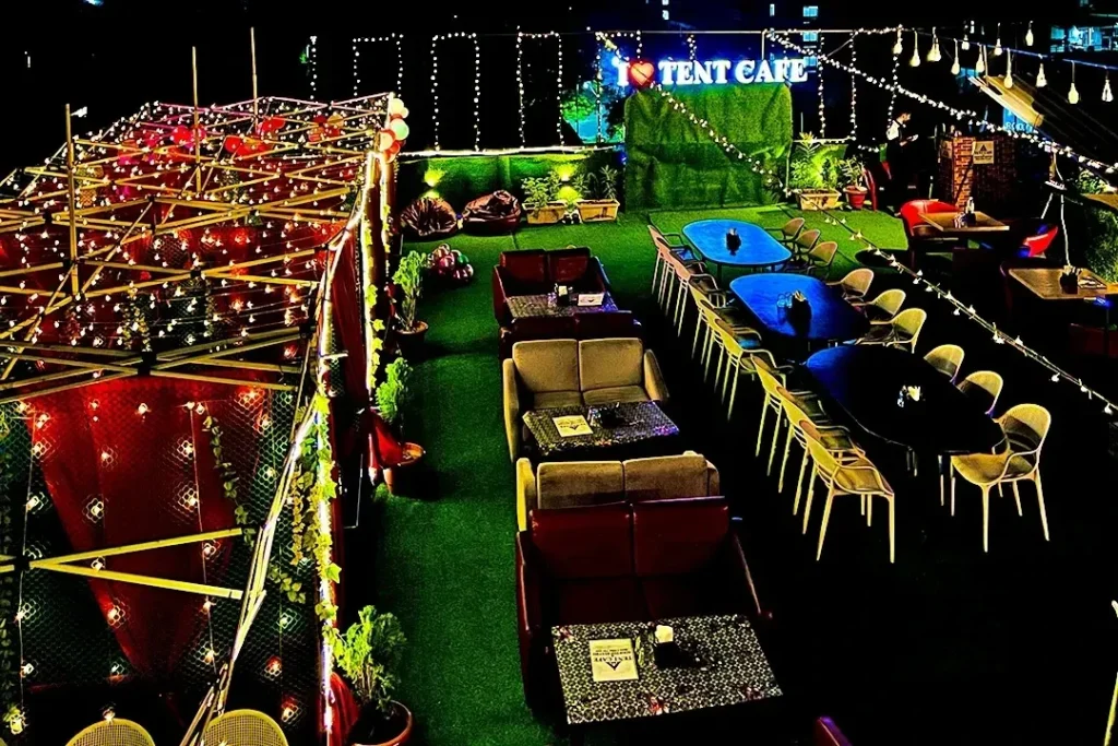 Fine dine restaurant rooftop table setting at Tent Rooftop Restro Cafe Navrangpura Ahmedabad